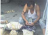 Cutting stones in shape of leaves and motifs.